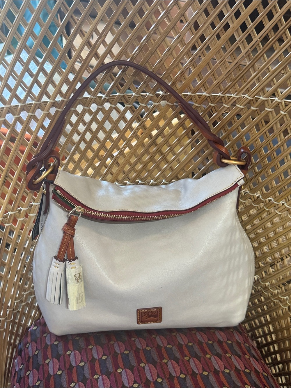 Dooney and Bourke White Leather Twisted Shoulder Strap Bag with Brown Trim